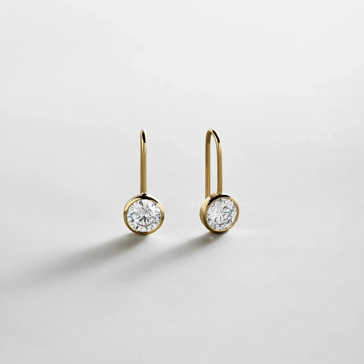Gold-Plated Oval Crystal Drop Earrings