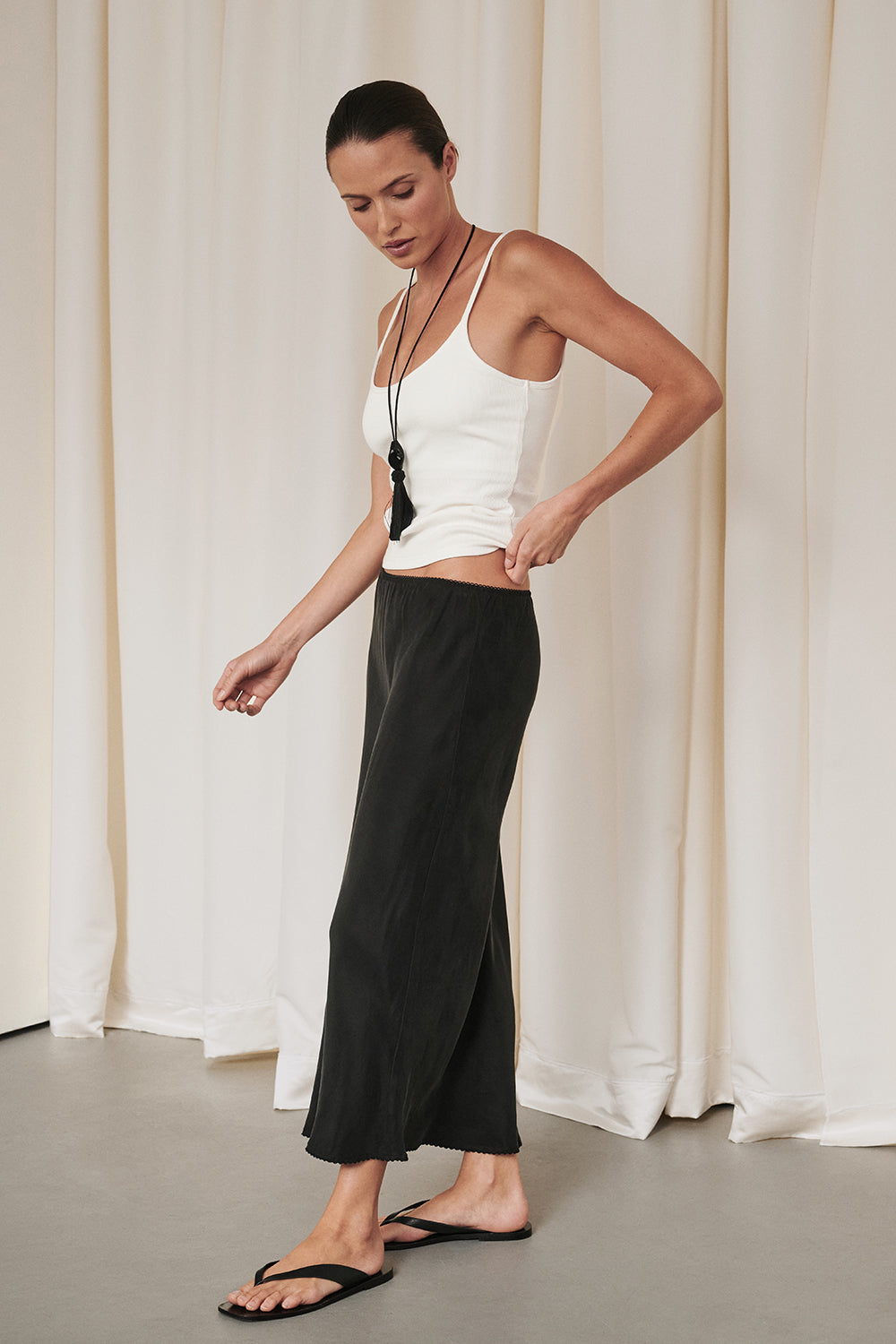 ARELIA BLACK CUPRO MIDI SKIRT