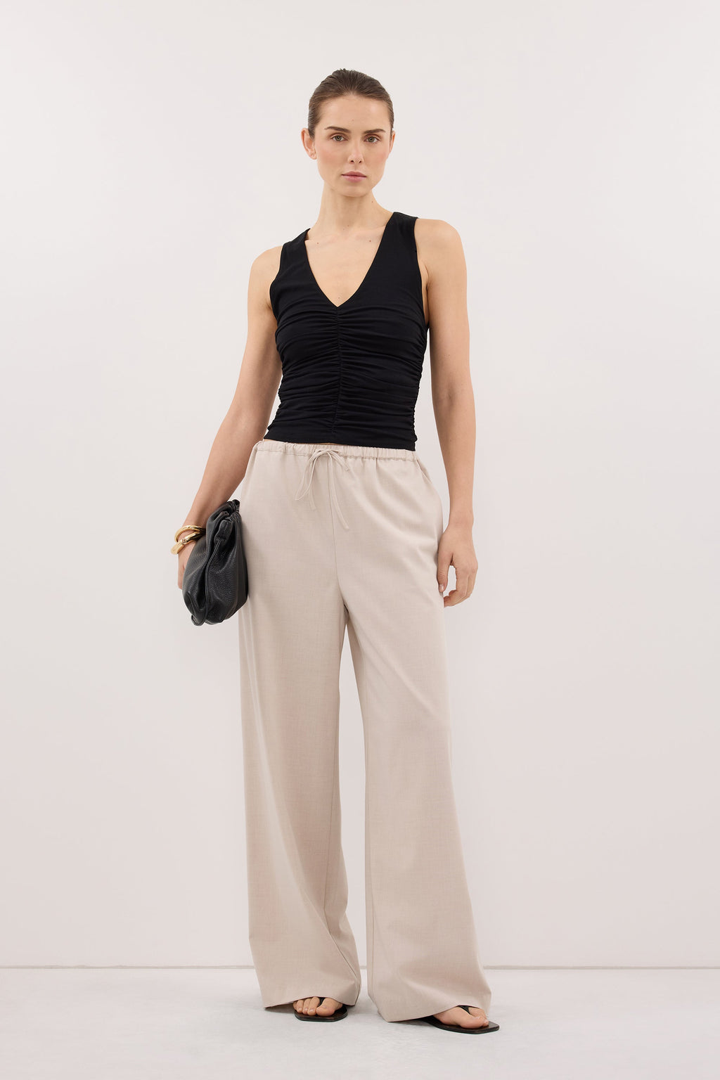AVELIN BLACK RUCHED V NECK KNIT TOP