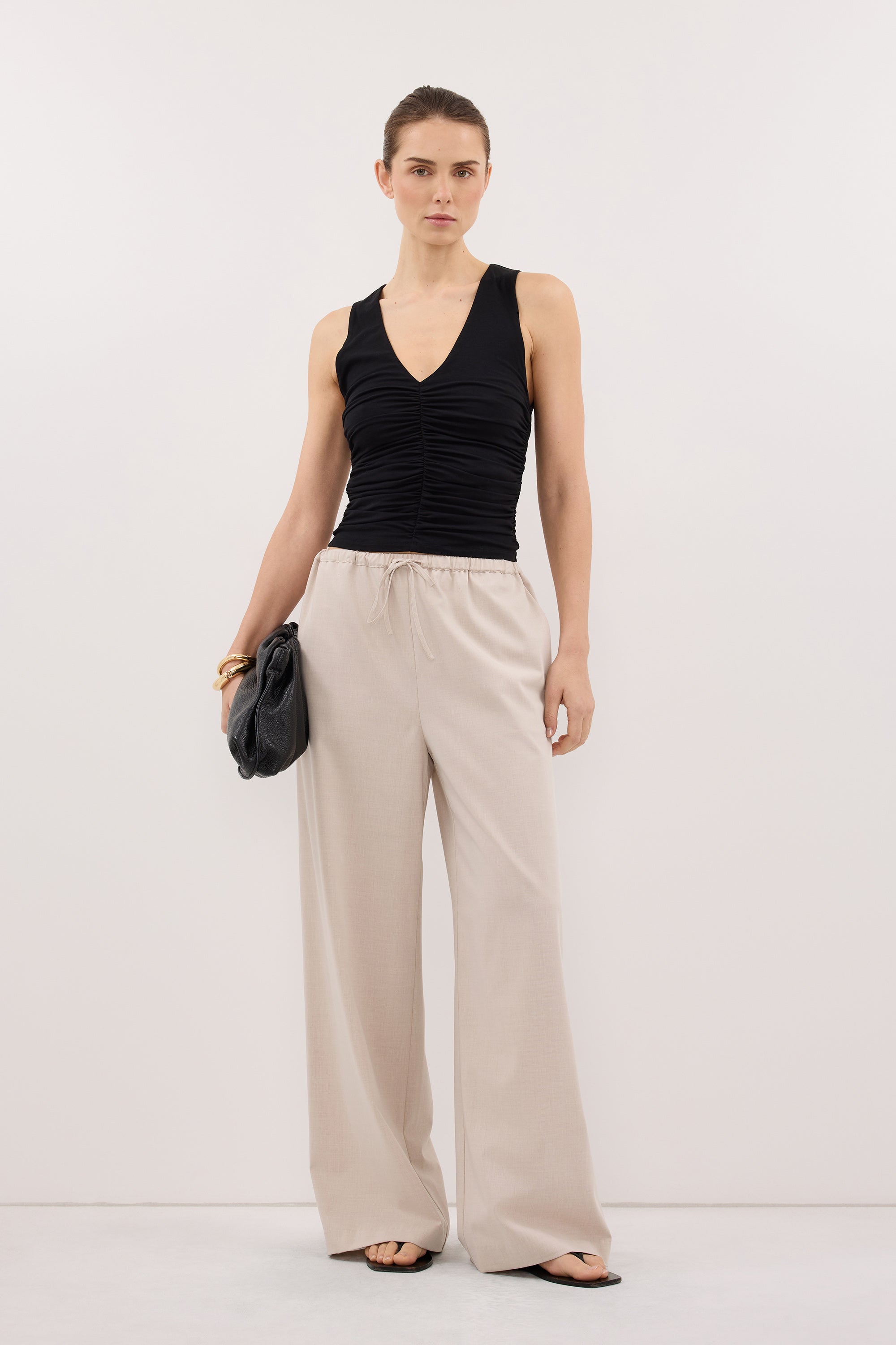 AVELIN BLACK RUCHED V NECK KNIT TOP